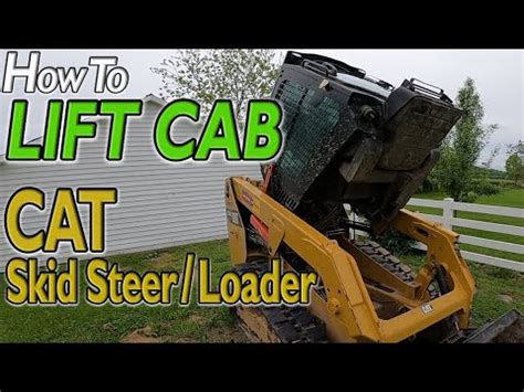 how to flip cab on skid steer|cat skid steer cab lift.